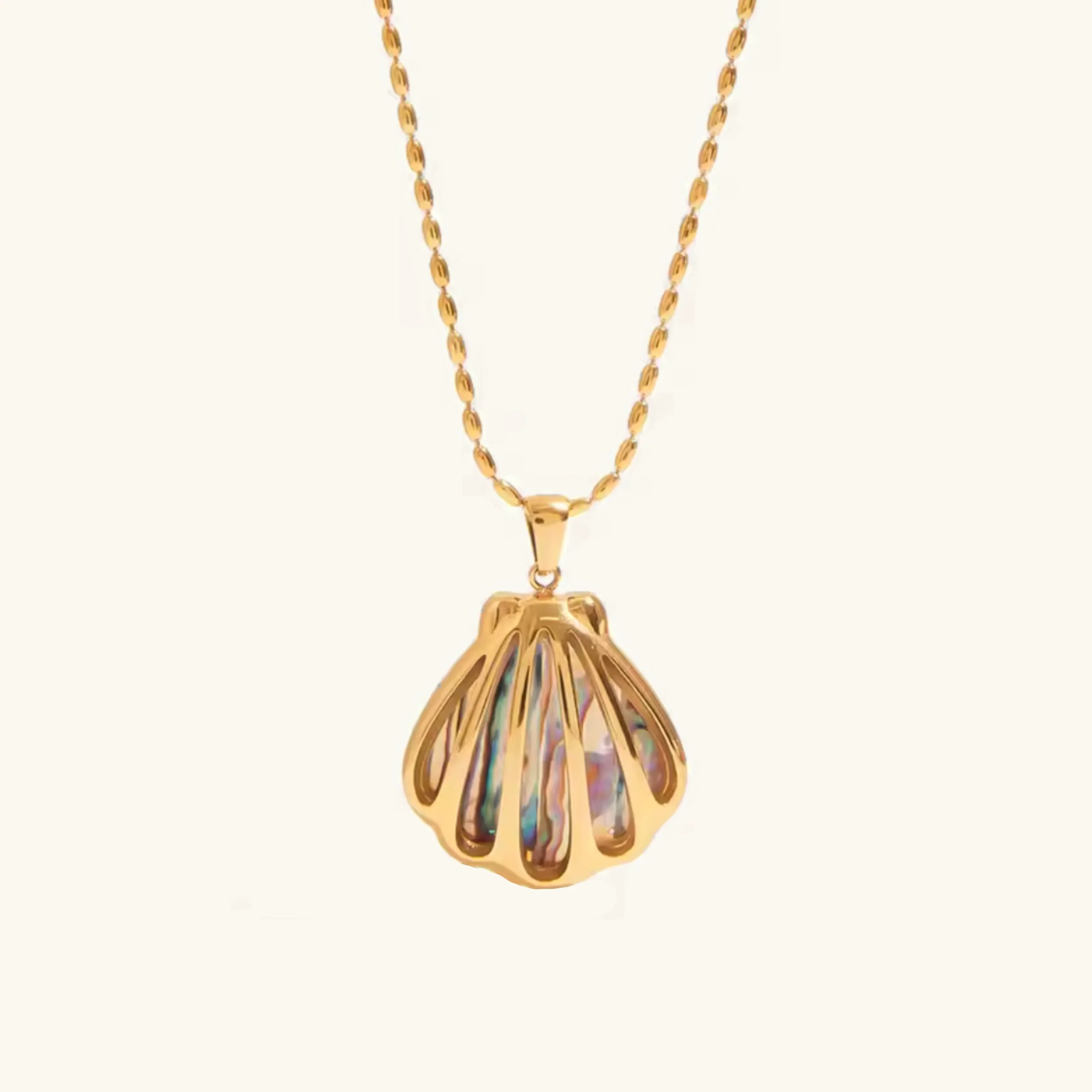 Nixie Gold Seashell Pendant